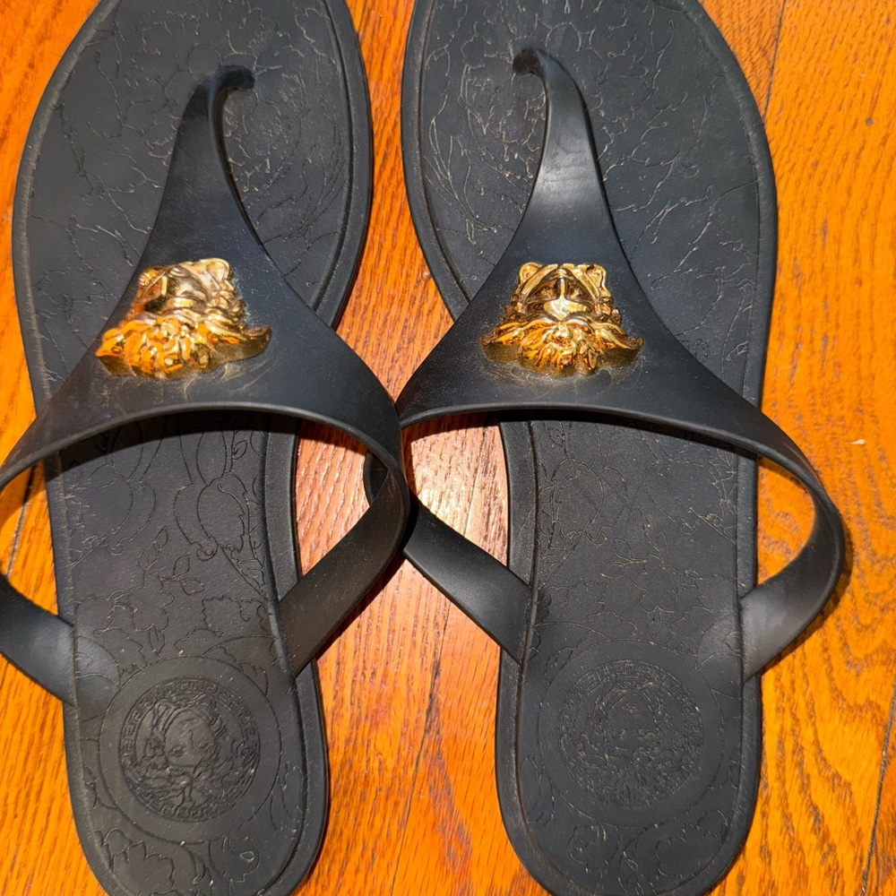Versace Black and Gold Sandals with Medallion Accent